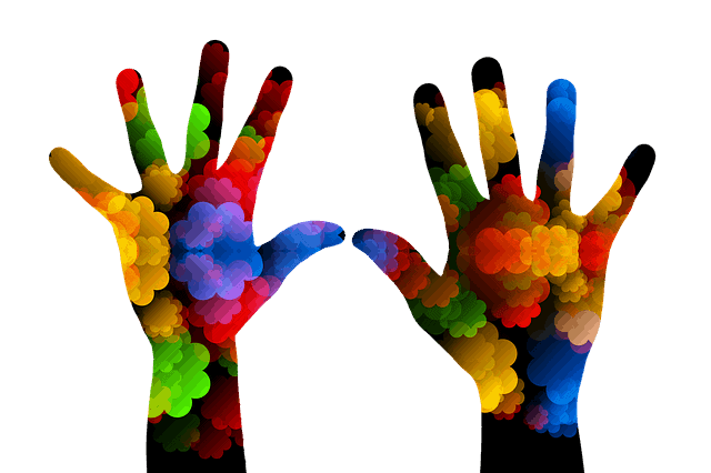 Hands with colorful clouds on them